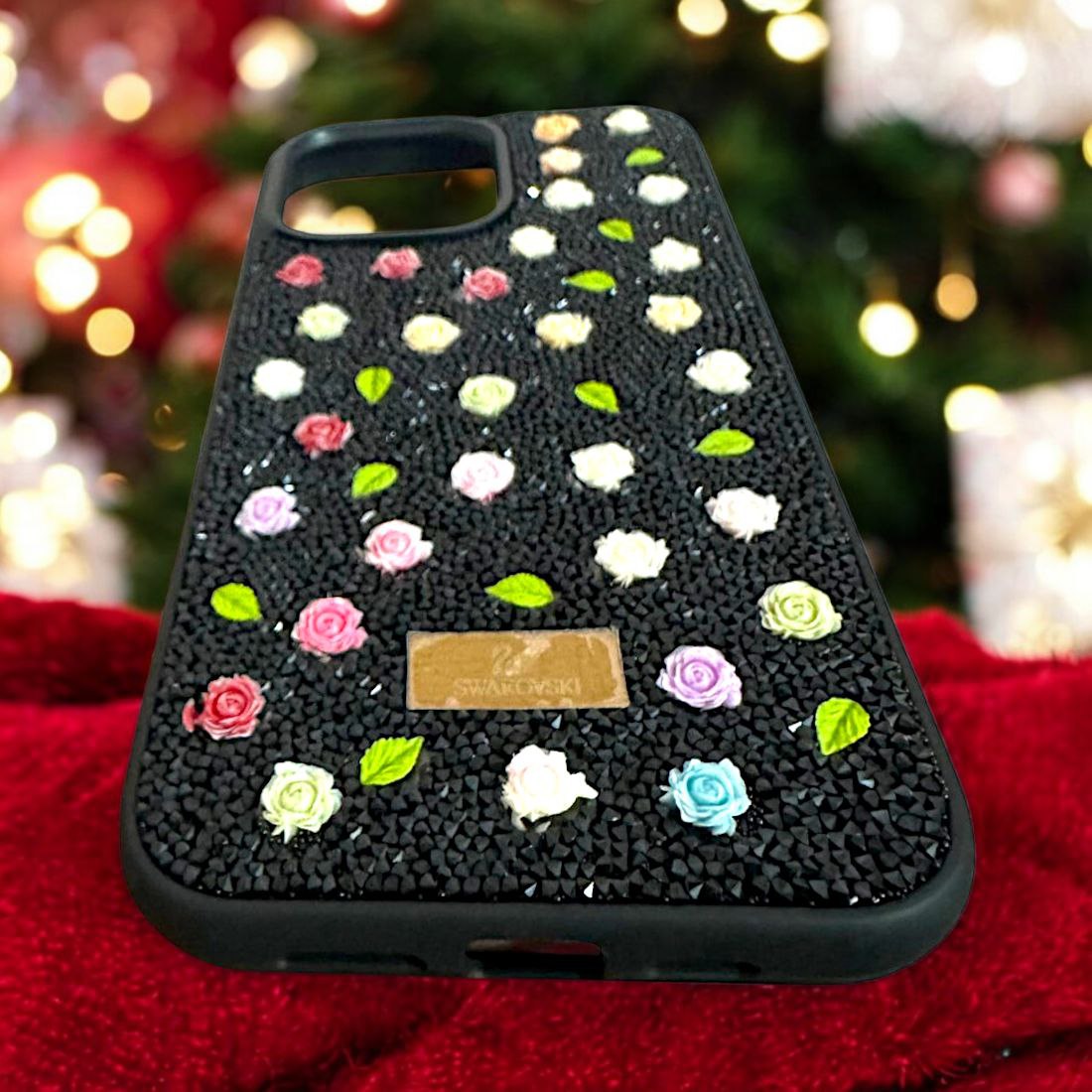 Chic black iPhone cover with Swarovski inspired floral elements, iphone 15 cover offering a stylish blend of glamour and protection.