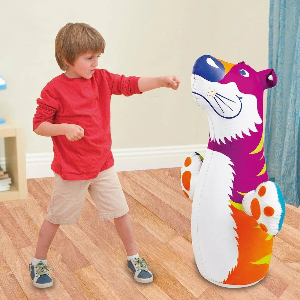 A child playing with a tiger themed inflatable bop bag, perfect for energy release and fun