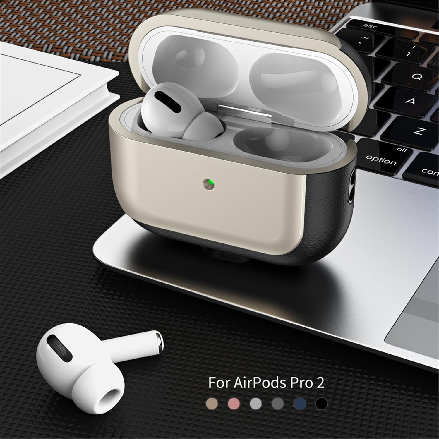 airpods pro case placed in a titanium gray and black case beside a laptop, combining premium protection with everyday convenience.