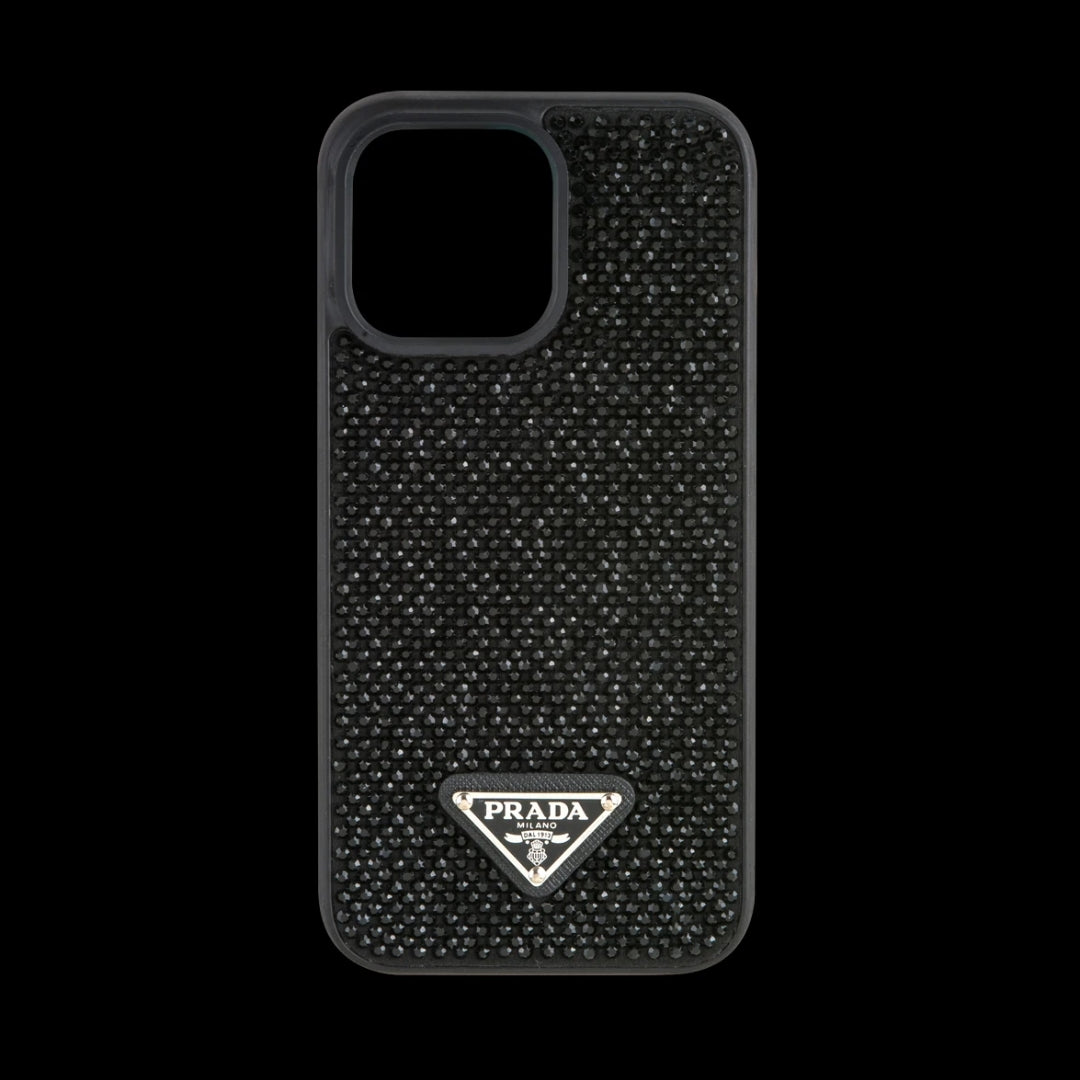 Elegant black iPhone case with shimmering crystal detailing and embossed Prada Milano logo, shot against a black background for iphone 15 pro covers