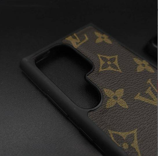 Detailed shot of the textured leather surface with golden LV monogram and sleek black frame around the Samsung camera cutout for s25 ultra