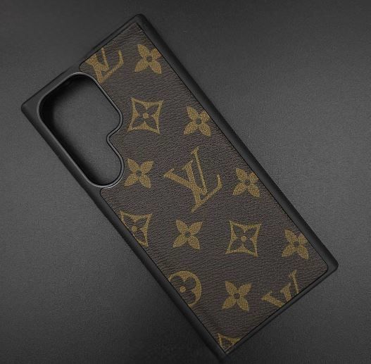 Dark brown premium leather Samsung S25 cover with gold LV monogram print, samsung covers offering stylish protection in a luxury finish
