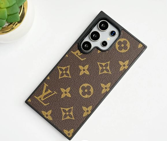 Close up of luxury brown leather Samsung cover with bold gold LV branding, crafted for s25 ultra for an elegant look