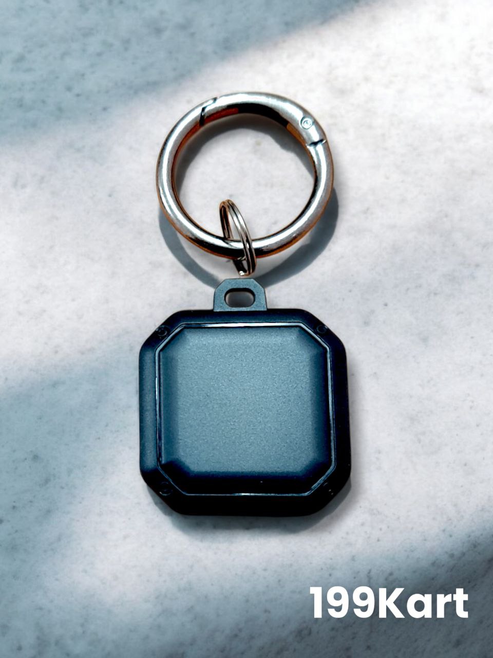 Blue square shaped AirTag case from 199Kart with glossy finish and attached silver ring.