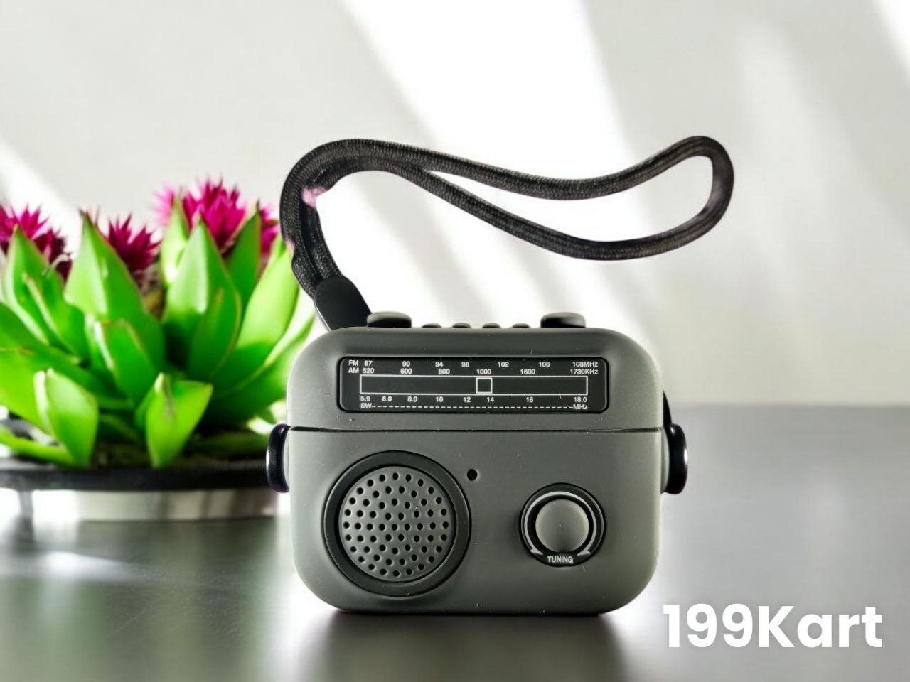 Dark grey retro radio shaped airpods pro 2 case with wrist strap