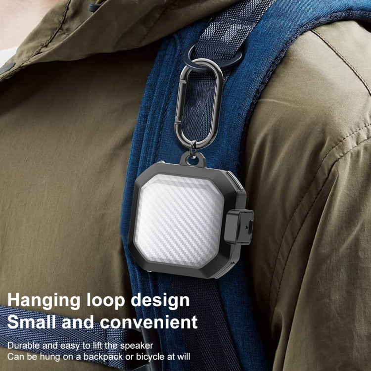 Portable samsung buds clipped to a backpack strap using a secure hanging loop design for travel ease.