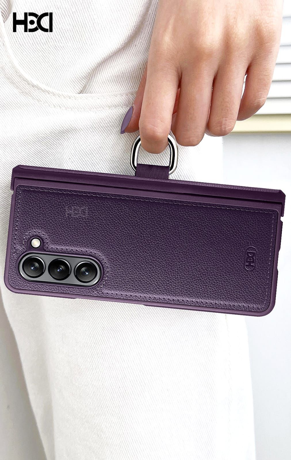 Purple leather Samsung Z Fold 5 and 6 cover with metal ring grip, providing stylish hinge protection.