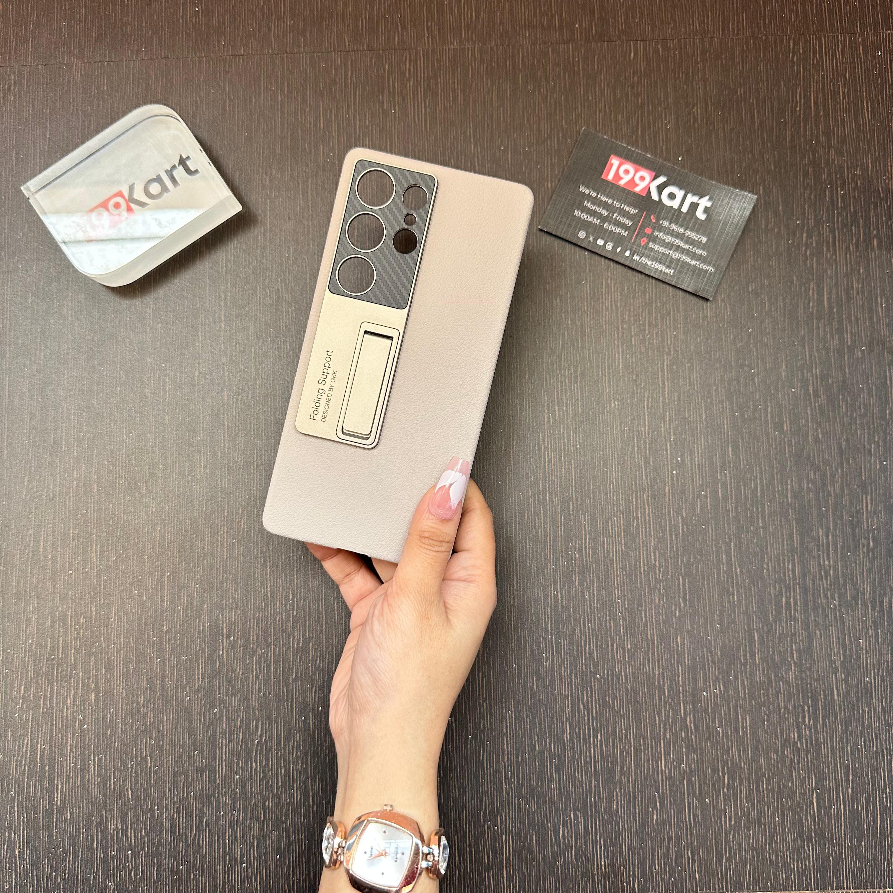 handheld beige Samsung cover featuring a foldable kickstand and camera cutout detailing for S25 ultra