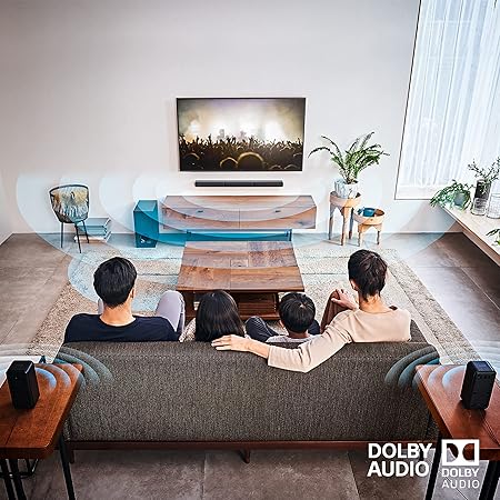 Family enjoying immersive surround sound from the Sony HT S40R home theatre system with Dolby Audio during a movie night