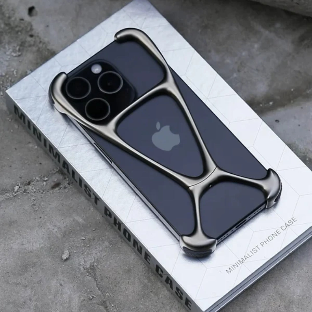 Designer metal frame iPhone case for iphone 15 pro max cover in bronze with elevated bumper corners, placed on product packaging