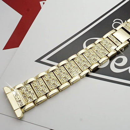 Close up view of a dazzling gold apple watch straps, featuring a sturdy clasp and high quality embedded stones for a glamorous finish