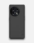 Rear view of a matte black mobile cover for OnePlus 11R with precise camera cutout and smooth finish