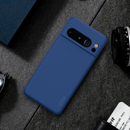 Blue Google Pixel 8 Pro case placed on a stylish desk setup, highlighting its smooth and minimalistic design