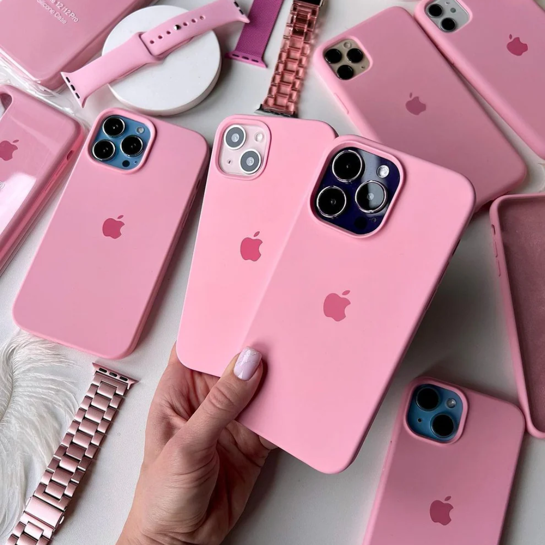 A beautiful flat lay of pink iPhone cases with multiple iPhone models, Apple watches, and matching band premium silicone mobile covers designed for iphone 15 pro covers