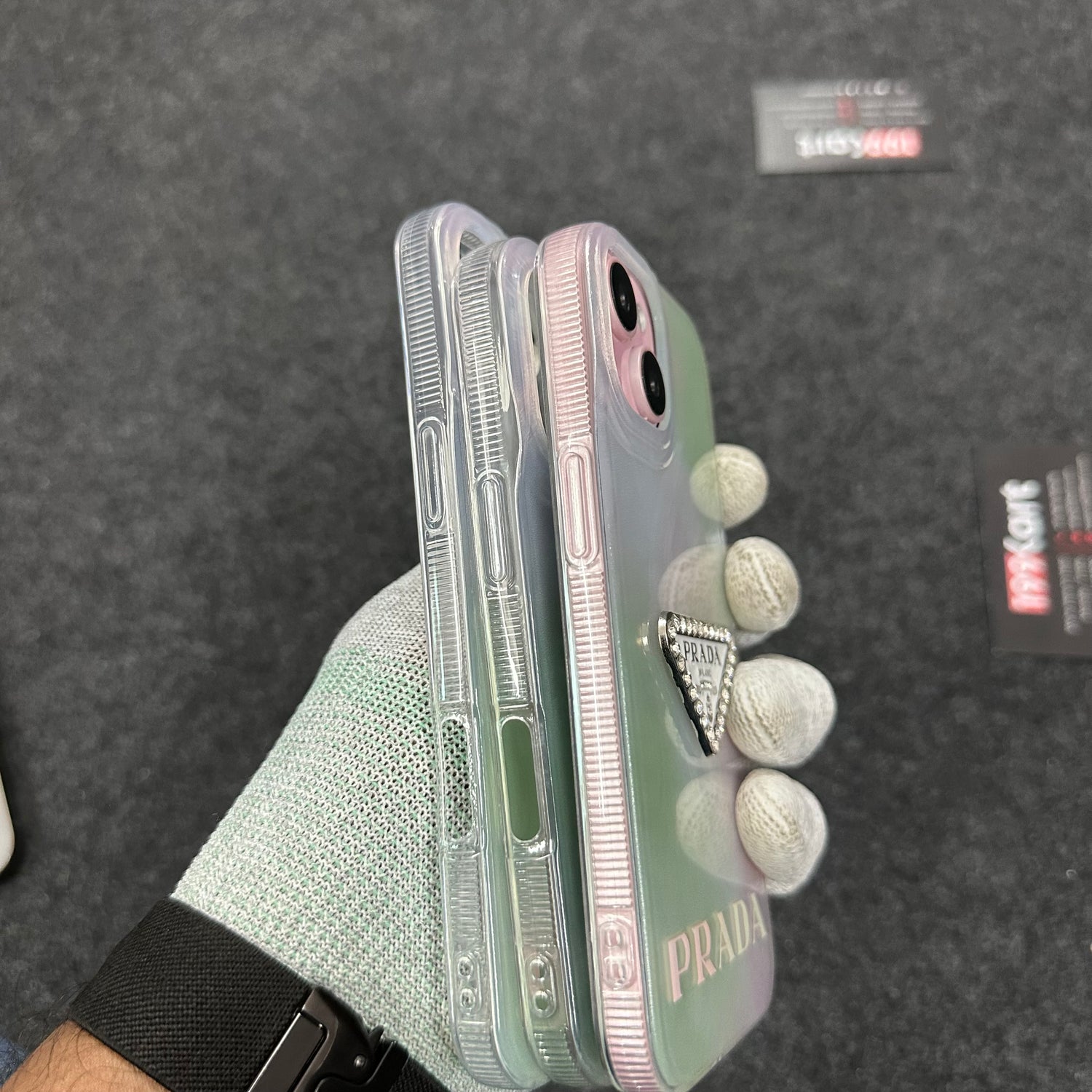 Glossy electroplated iPhone cover with stone textured details, iphone 15 covers offering a modern and fashionable appearance.