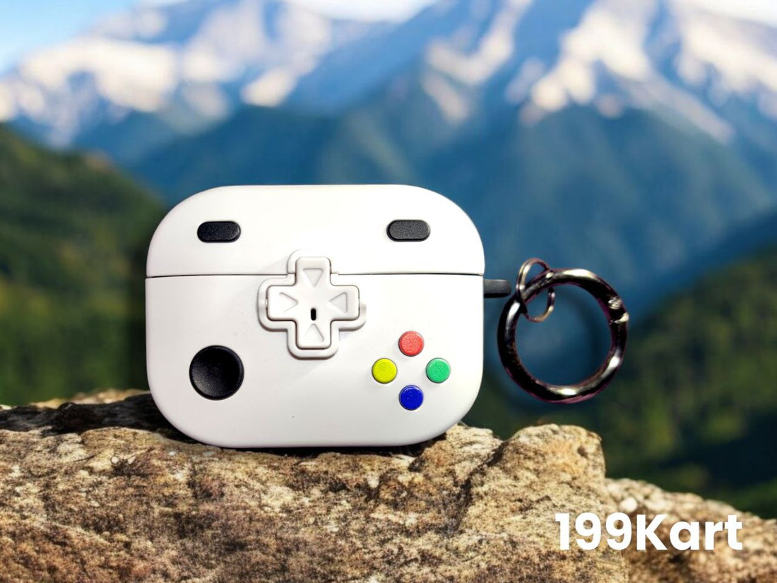 Game controller style airpod pro case with white finish and ring holder displayed outdoors on a rock