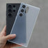 Pair of translucent mobile covers for  S25 Ultra in matte black and smoky grey, designed with vertical grooves for grip.