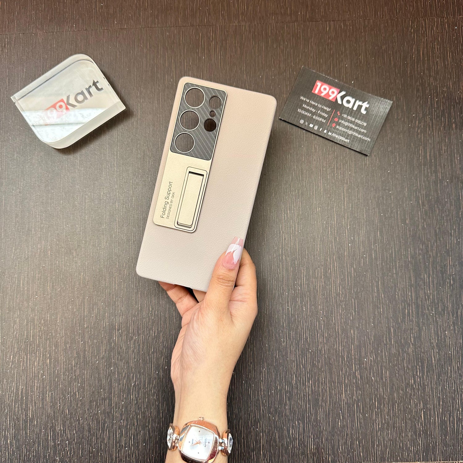 handheld beige Samsung cover featuring a foldable kickstand and camera cutout detailing for S25 ultra