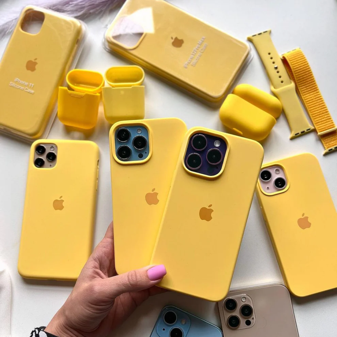 A person displays multiple yellow iPhone cases, iphone 15 pro max cover showcasing their vibrant color and sleek design