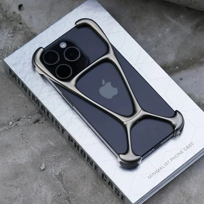  Designer metal frame iPhone case for iphone 15 pro max cover in bronze with elevated bumper corners, placed on product packaging