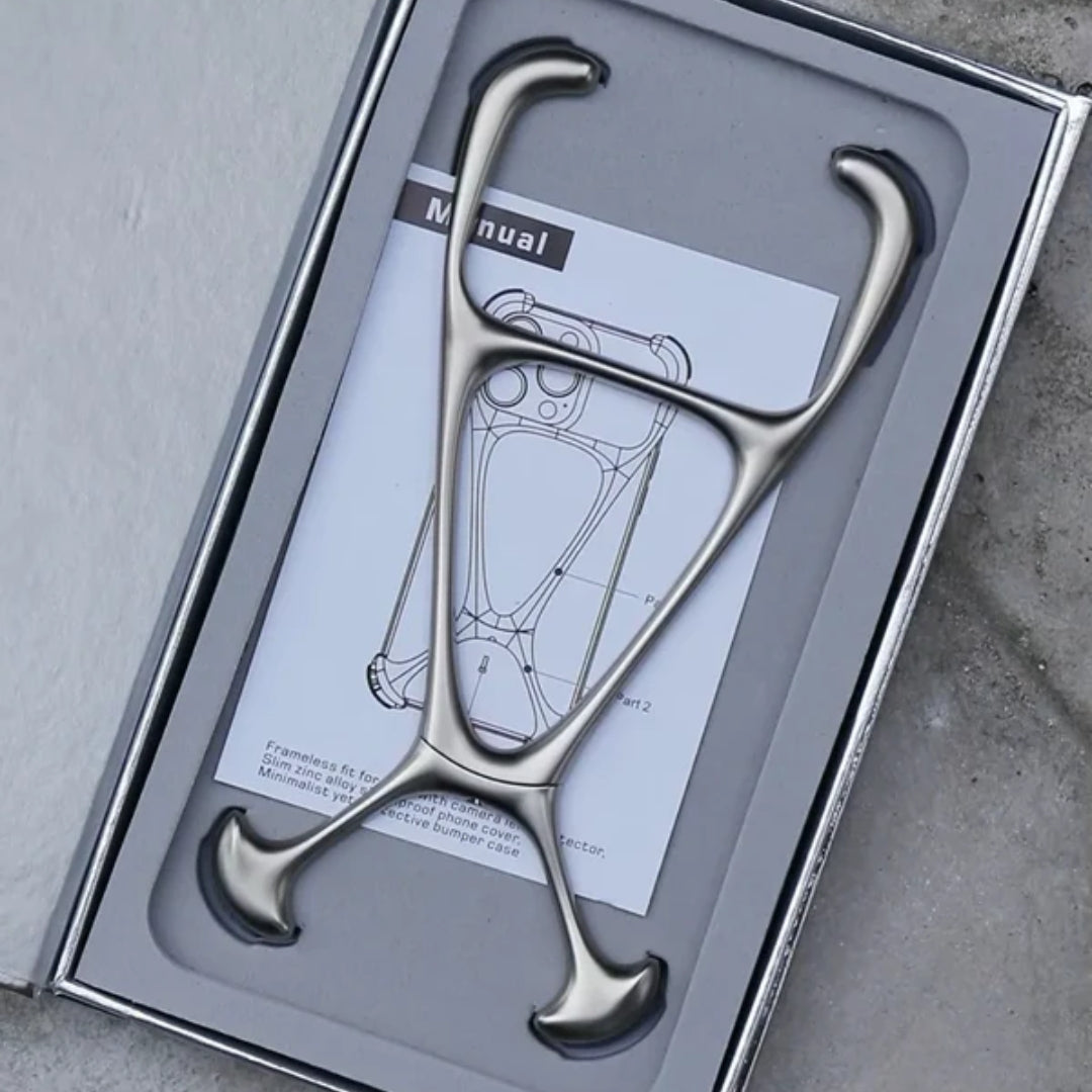  Silver skeleton style iPhone case in retail box, iphone 15 pro max cover highlighting the strong alloy build for drop protection